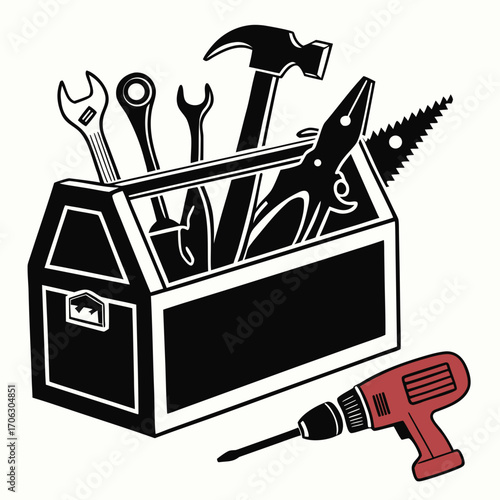 Toolbox filled with various hand tools and a power drill representing home improvement and repair projects at home or work