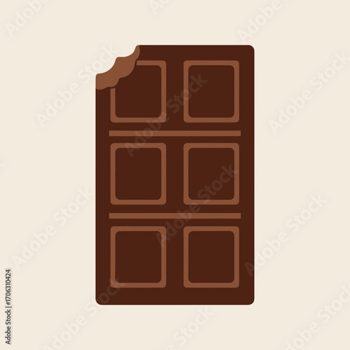 A bite taken from a dark chocolate bar.