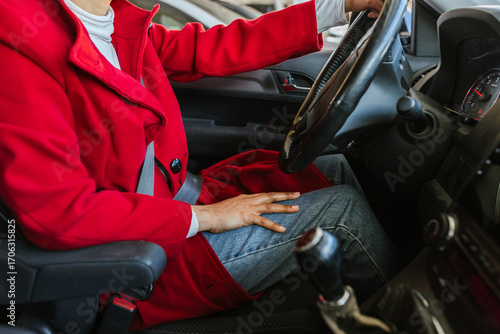a woman maneuvering her car