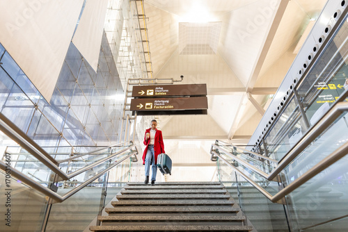 a woman arriving at the airport