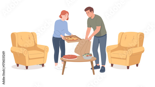Couple setting up for a pizza night at home.