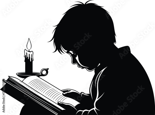 Silhouette of a young boy reading a book by candlelight in the dark night