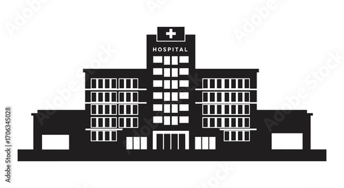 a hospital building with multiple windows and entrance doors