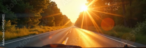 A shimmering heat haze rises from a sun-baked asphalt road, visible through a clean car windshield on a hot summer day The intense summer sun glints off the glass , desert, bright