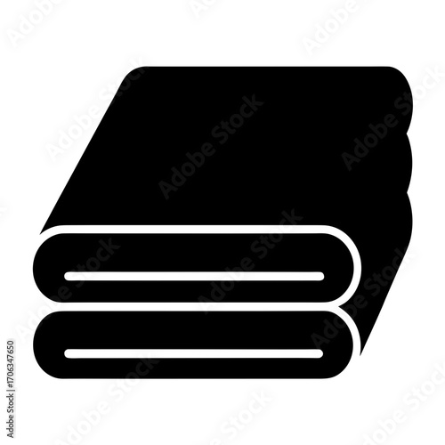 Neatly folded stack of towels or blankets in black and white