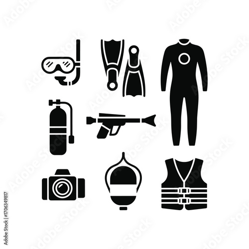 Collection of scuba diving gear including mask snorkel wetsuit tank fins and camera equipment