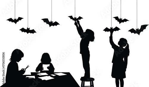 Children crafting halloween decorations with bats in a silhouette illustration