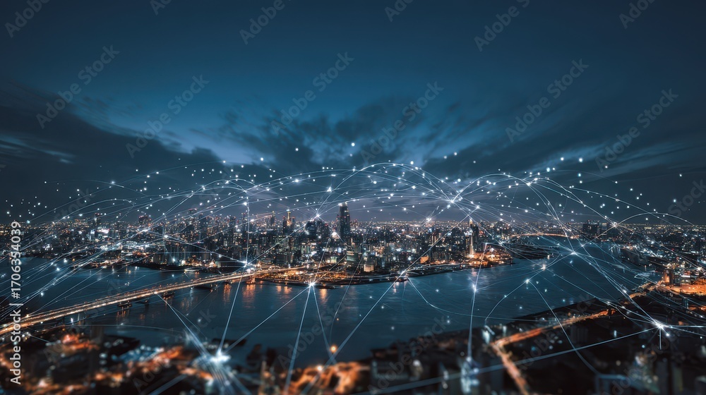 Obraz premium Urban skyline illuminated at night with network connections overlaid