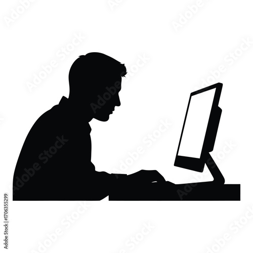 Silhouette of a person working diligently on a computer screen indoors silhouette