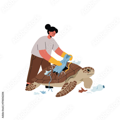 Person cleaning debris from a sea turtle