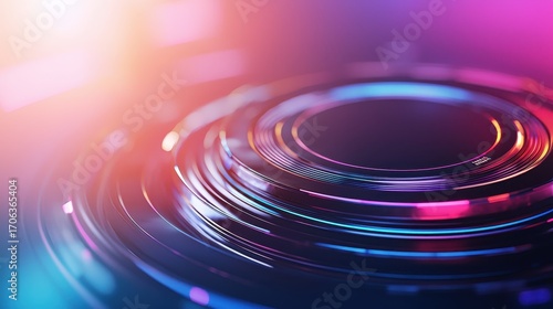 A vibrant abstract design featuring concentric circles with glowing effects, blending hues of blue, pink, and purple against a dark background.