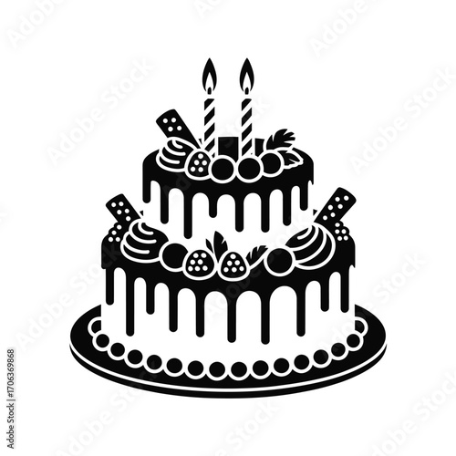 Two tiered black and white birthday cake with candles and drip glaze