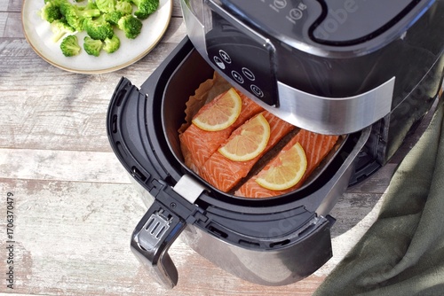 Cooking fish in a deep fryer.