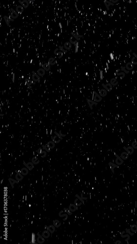 Vertical video with winter snow overlay. Isolated falling snow animation - transparent background. Seamless loop, alpha channel included.
