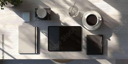 Overhead View of Minimalist Workspace with Tablet and Coffee