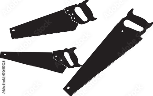 Three vintage hand saws in silhouette