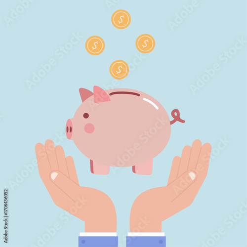 Hands support a piggy bank as coins drop in—symbolizing financial growth, saving habits, and responsible money management