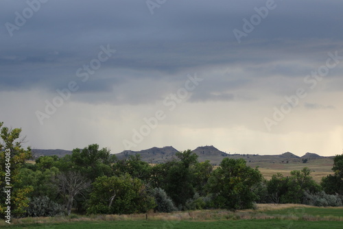 storm clouds over the hills