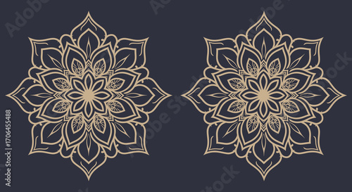 intricate golden mandalas on dark blue background