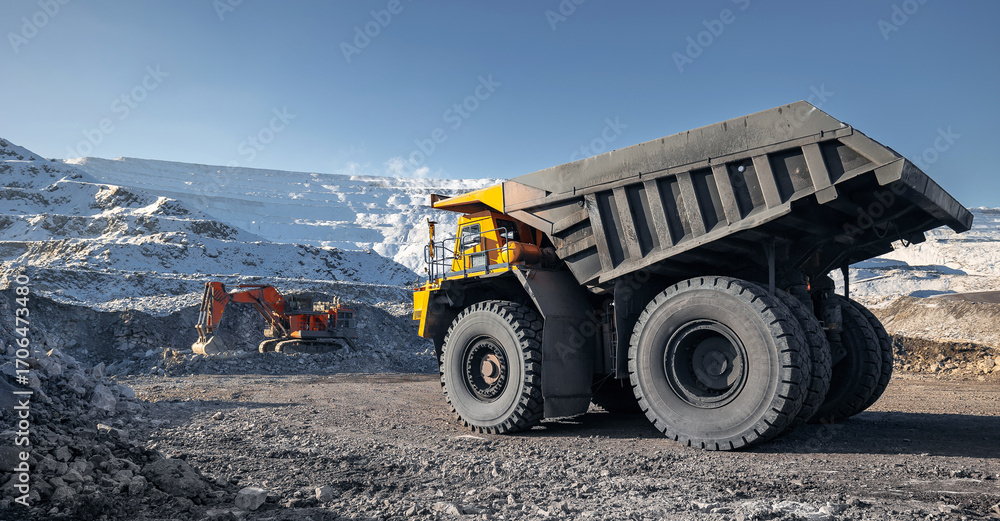 Obraz premium Banner coal mining, heavy machinery work in open pit gold ore mine