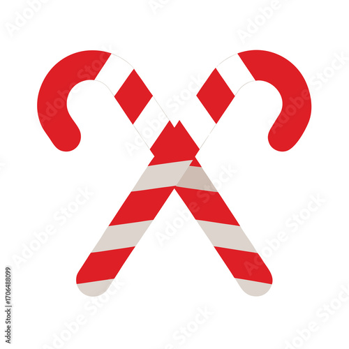 , two candy canes crossed on white background