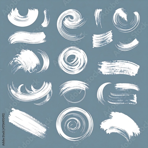Set of 16 white paintbrush strokes on muted gray background