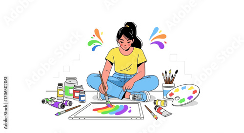 Young Artist Painting a Colorful, Creative Artwork at Home with Art Supplies