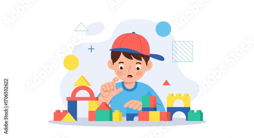 Young Boy Plays With Colorful Blocks, Engaging in Creative Construction and Learning