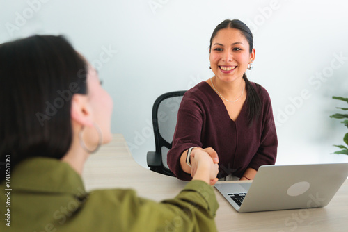 Client and Agent Shaking Hands After Consultation
