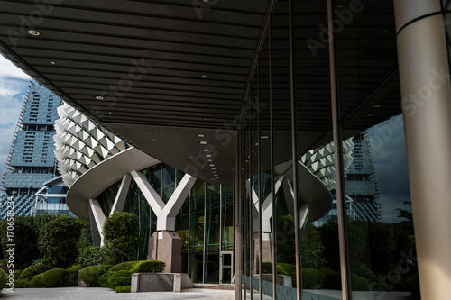 Architectural entrance of Esplanade with city reflections