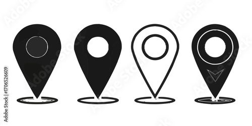 Four location pin icons in black and white with varying styles and design elements displayed clearly