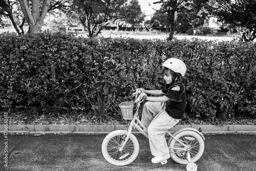 Little girl on bicycle