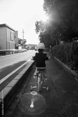 Little girl on bicycle