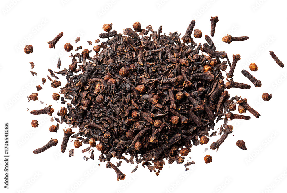 Fototapeta premium Dark brown spice blend, cloves and tea, scattered