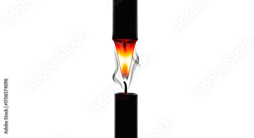 Dramatic representation of combustion event a black candle illuminating in high definition