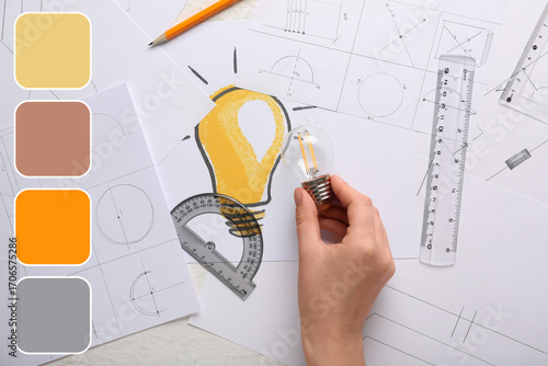 Hand of inventor with light...