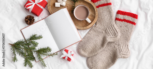 Blank book with cocoa, warm...