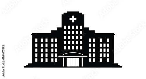 a large hospital building with cross symbol on top