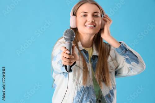 Young woman in headphones w...