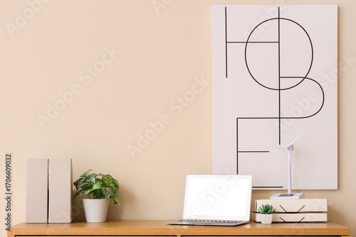 Blank laptop with wind turb...