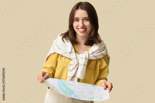 Female traveler with map on...