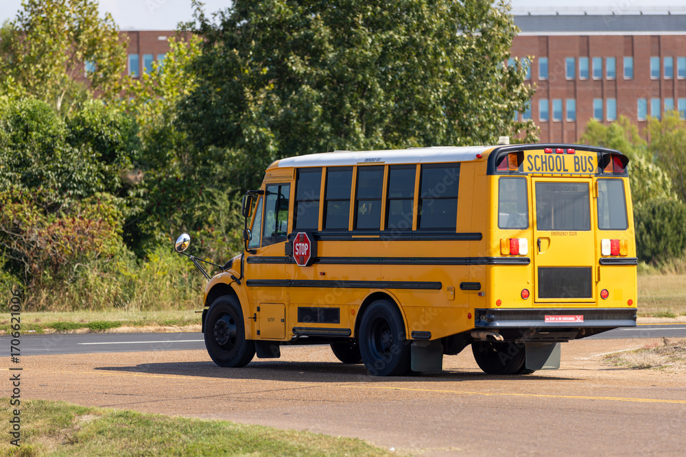 Obraz premium yellow school bus on the road