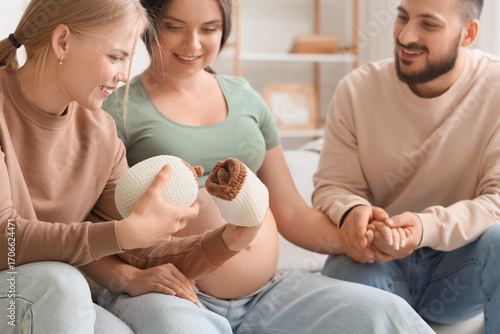 Young happy pregnant woman ...