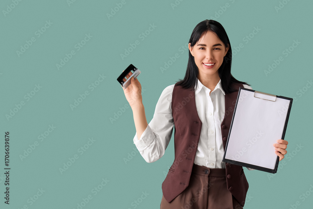 Naklejka premium Young secretary with document and stapler on green background