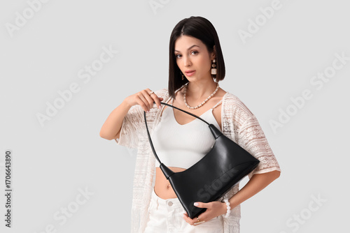 Beautiful young woman with ...