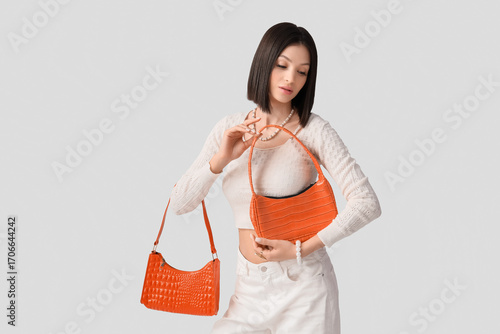 Beautiful young woman with ...