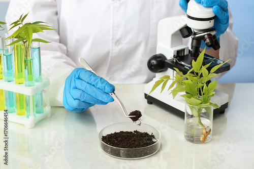 Female scientist with micro...