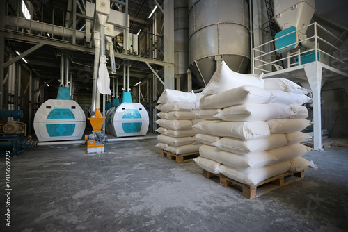 Flour bags in a mill stock image