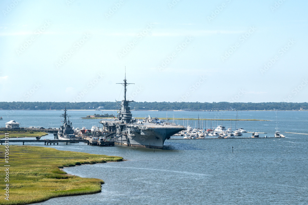 Fototapeta premium The warships of Patriots Point Naval & Maritime Museum, destroyer USS Laffey and aircraft carrier USS Yorktown, at the entrance to Charleston Harbor, SC, USA.