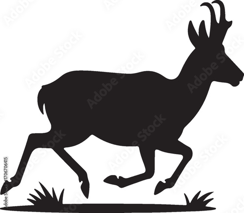 Silhouette of a running pronghorn antelope with horns and grass